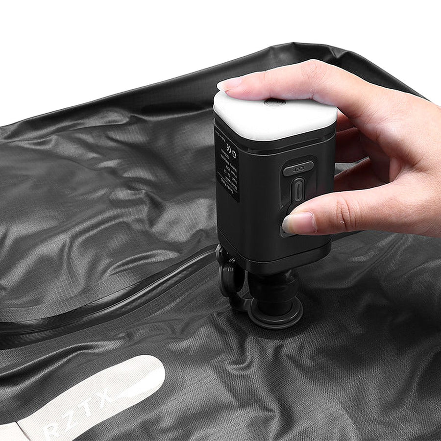 Auralane air pump removing air from the compression bag
